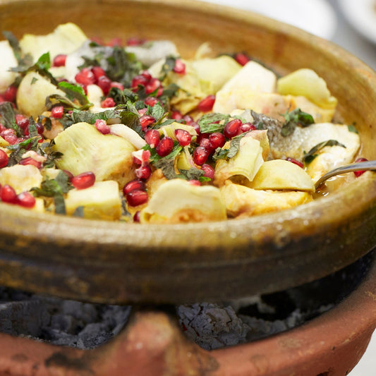 Moroccan tagine with fresh pomegranates